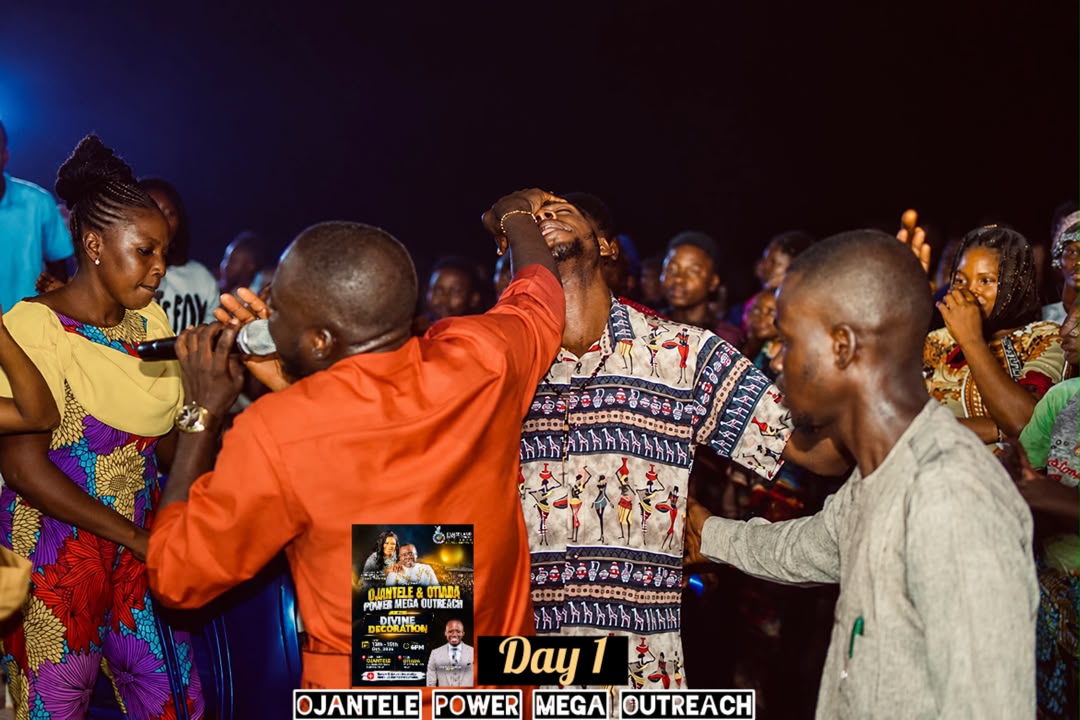 Minister laying hands on a man during deliverance prayer