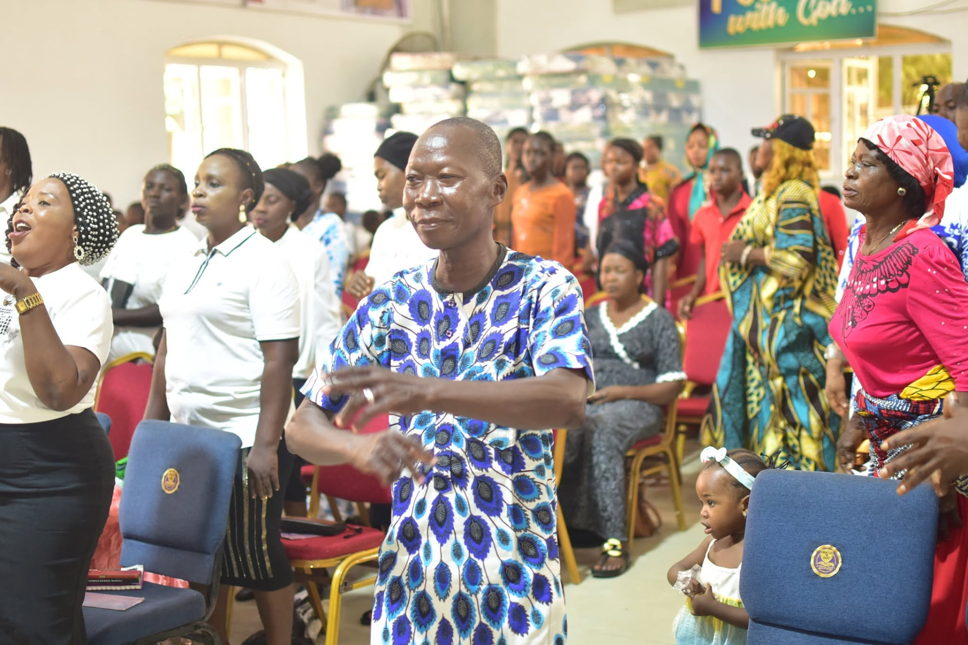 Believers dancing and singing joyfully in worship